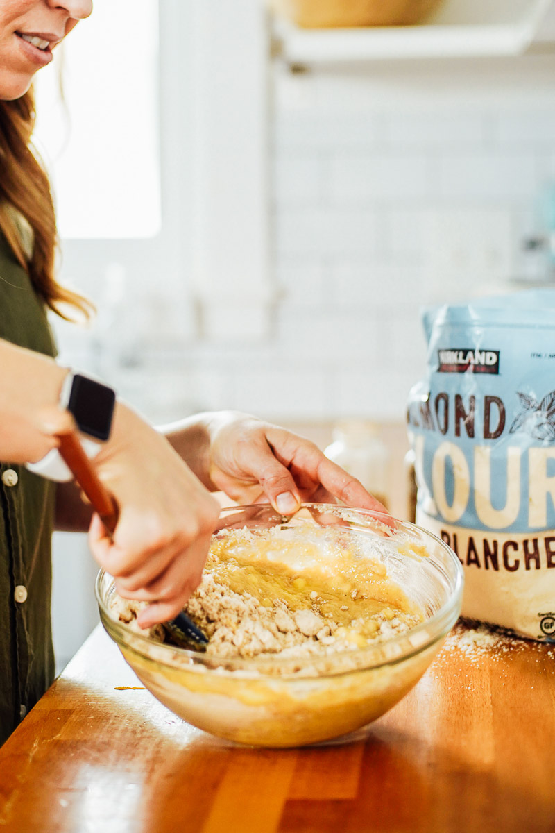 Combining the dry and wet ingredients in a large bowl.