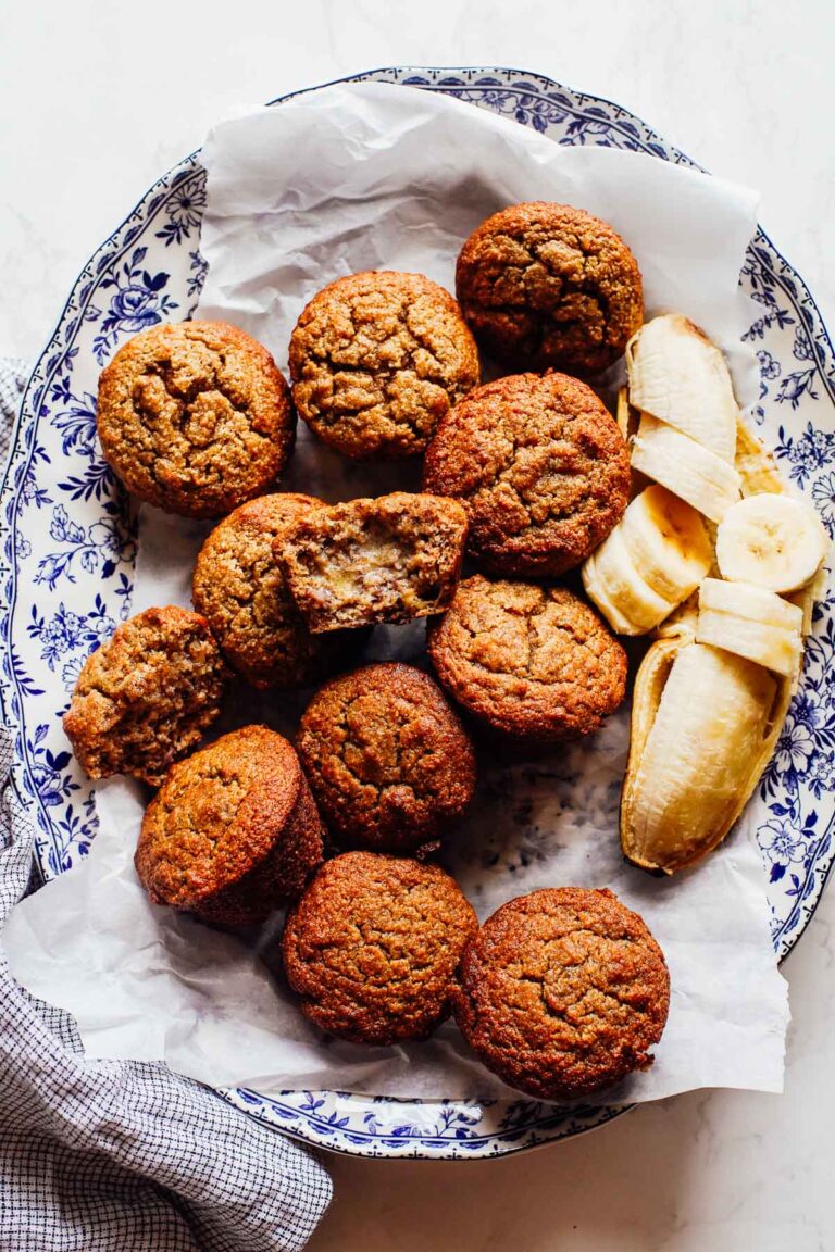 Banana muffins on a blue and white serving plate.