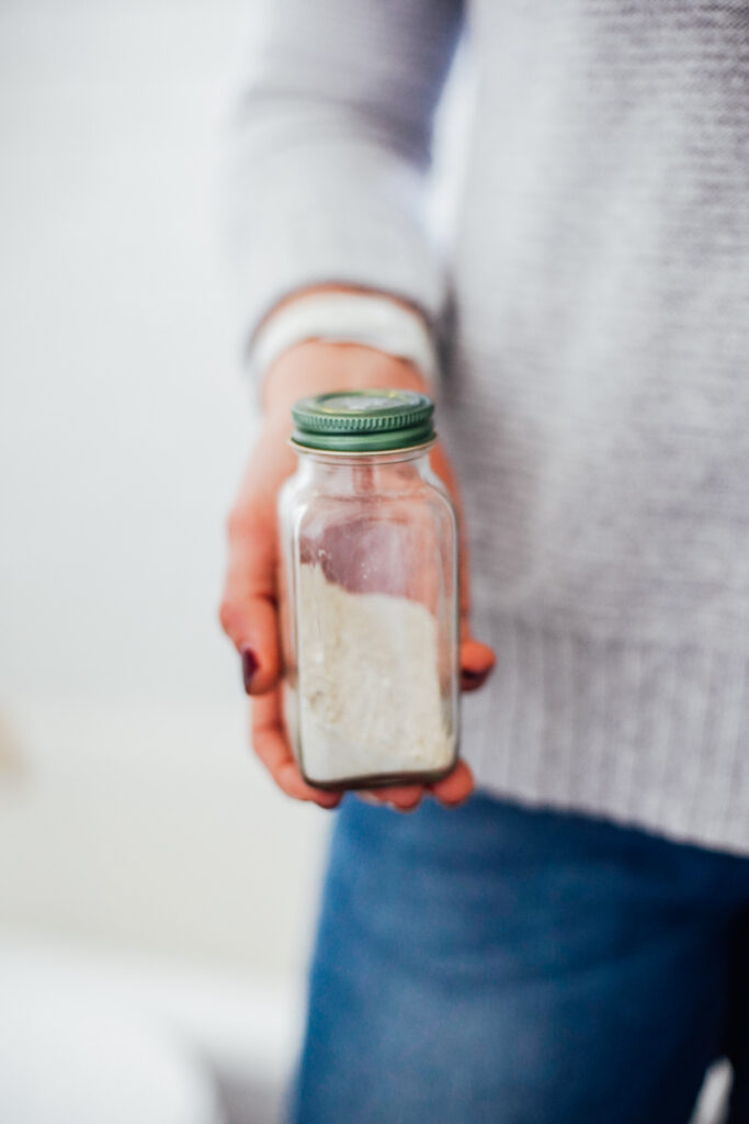 Homemade dry shampoo in a bottle. 