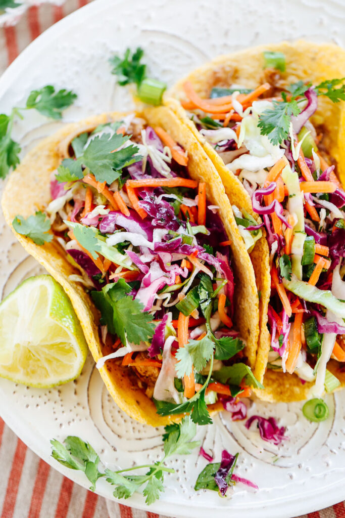 Slaw on corn tacos. 