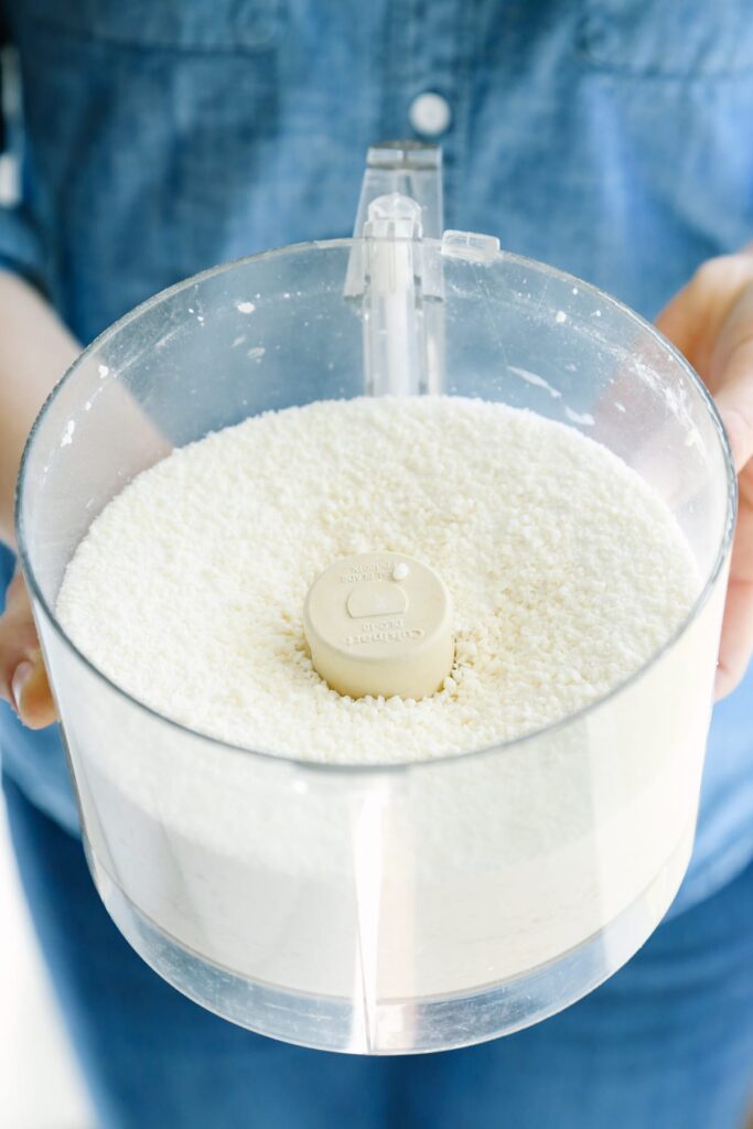 Washing soda mixed with castile soap crumbles in the food processor. 