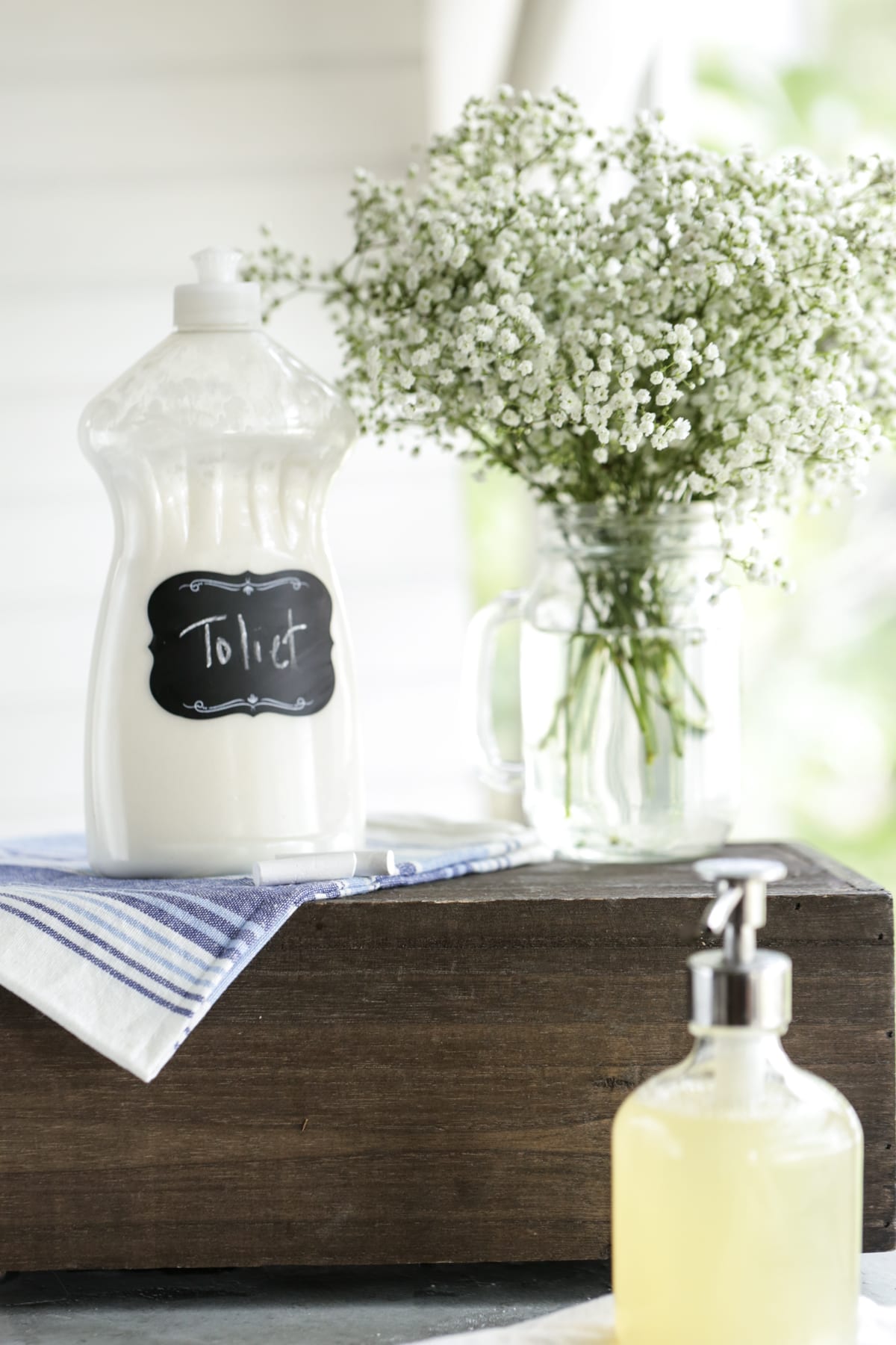 Homemade toilet bowl cleaner on the counter.