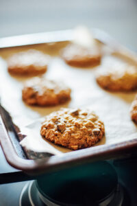 Fresh from the oven cookies, on a sheet pan.