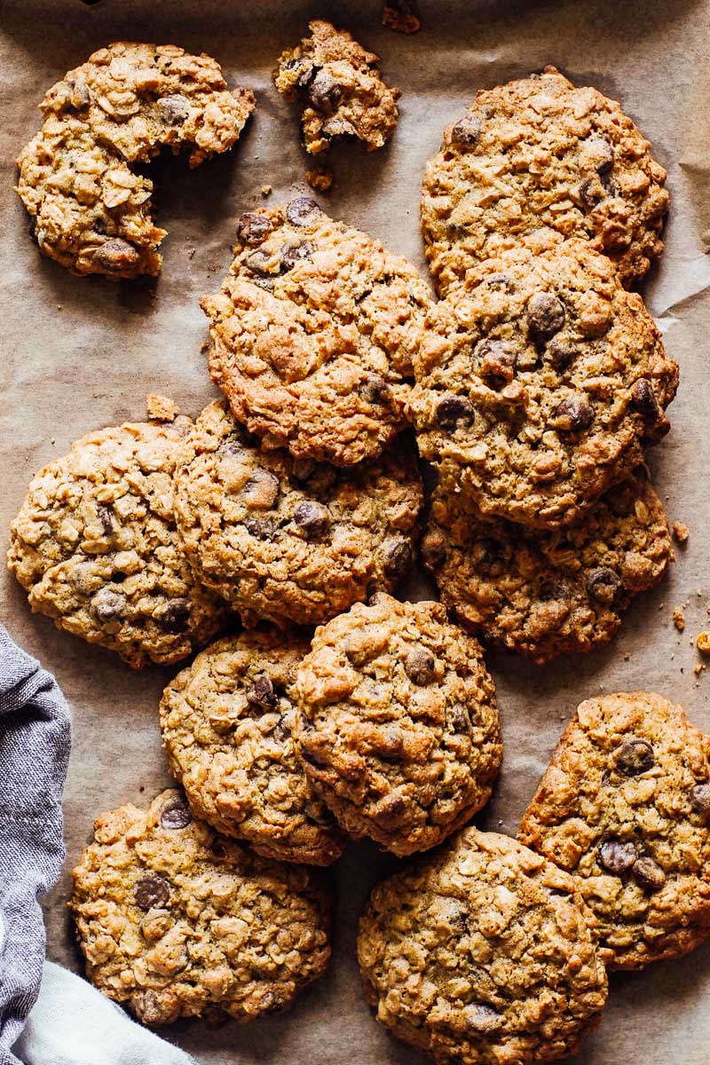 Oatmeal cookies on a sheet pan, fresh out of the oven.