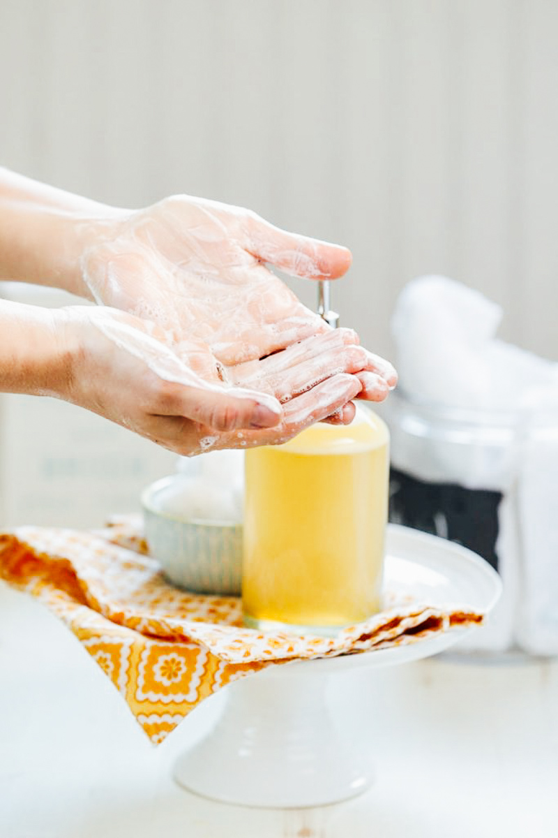 Soap suds on hands after pumping the soap into palms of hands.