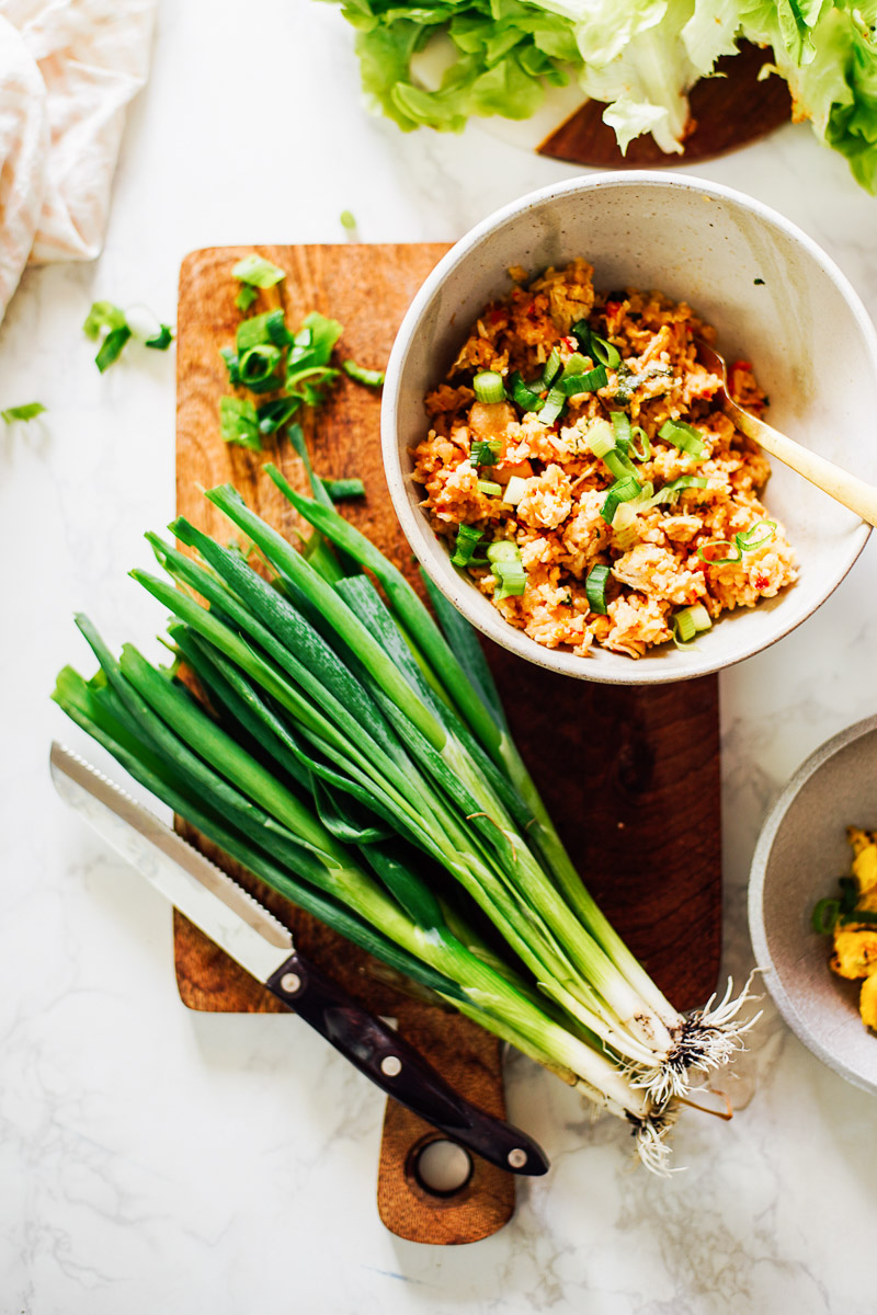 Using green onions as a garnish for fried rice. 