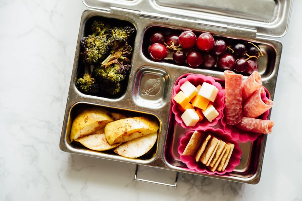 How to simplify packing school lunch with a rotational meal plan. How to create a rotational meal plan and use this list to build nourishing lunches.